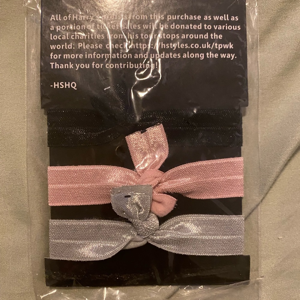 harry styles hair ties , wristbands merch